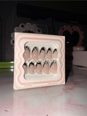 Celebritips Press-On Nails in Nude with Black French Tips & Bow Design